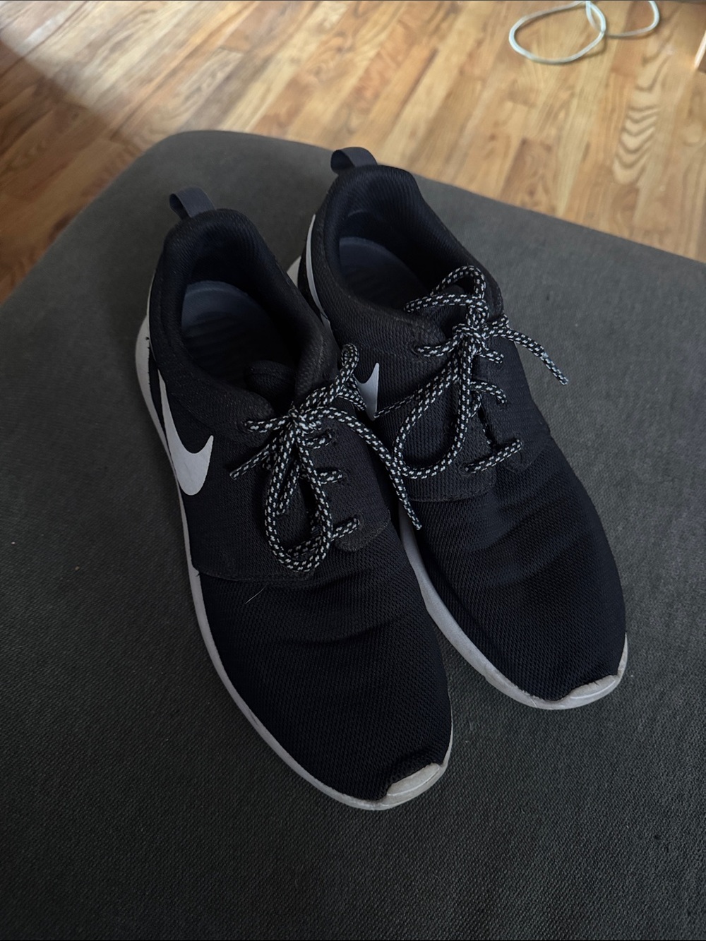 Nike Women’s Black Sneakers with White Swoosh